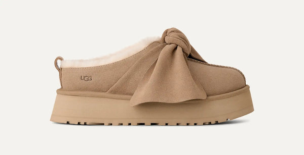 [1176290-SAN] WOMENS UGG PLATFORM SLIP-ON BOW