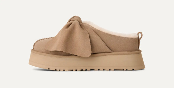 [1176290-SAN] WOMENS UGG PLATFORM SLIP-ON BOW