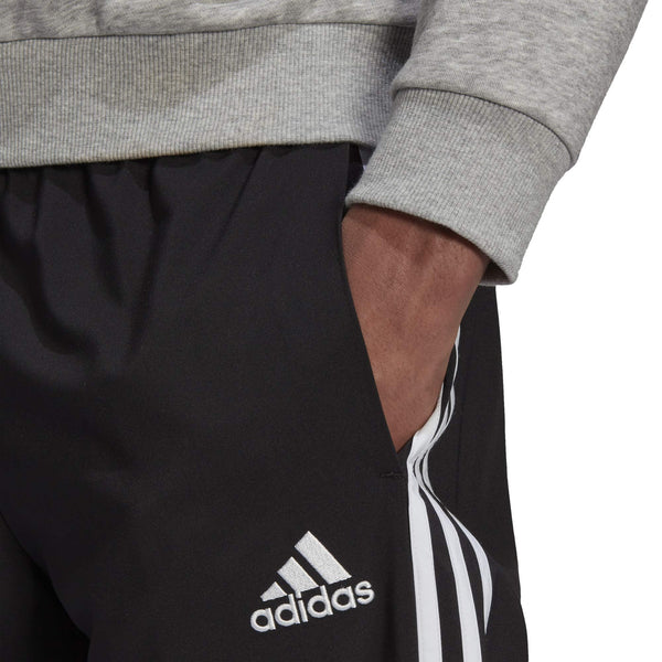 [GK8980] Mens Adidas Essentials Tapered Cuff Woven 3-Stripes Pants